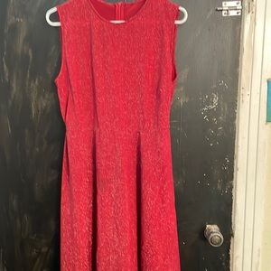 Red, sleeveless woman’s skater cocktail a line dress